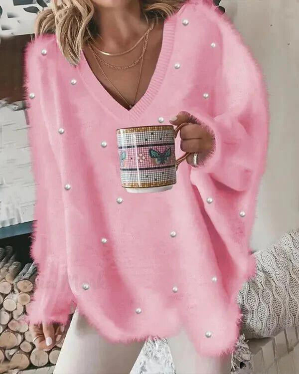 Kin | Langärmeliges flauschiges Top mit Perlen