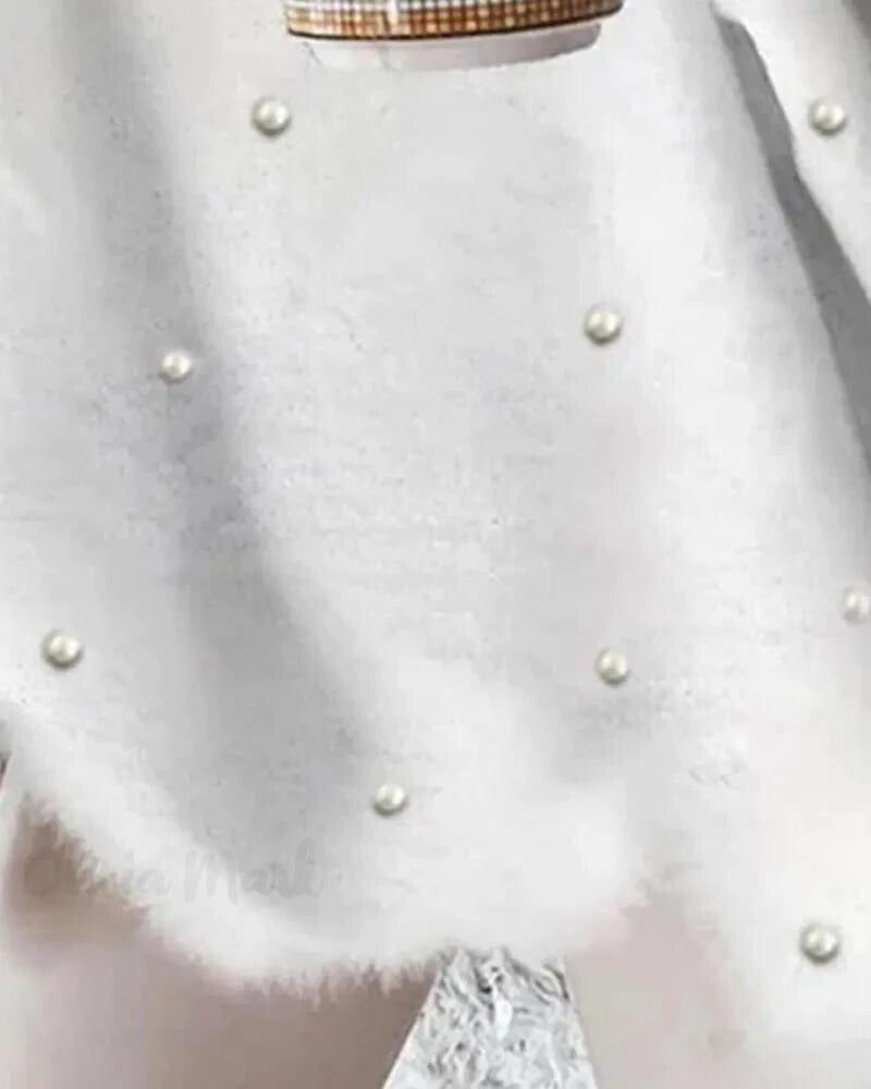 Kin | Langärmeliges flauschiges Top mit Perlen