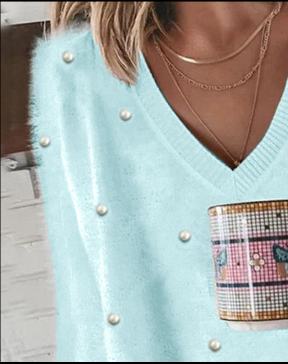 Kin | Langärmeliges flauschiges Top mit Perlen