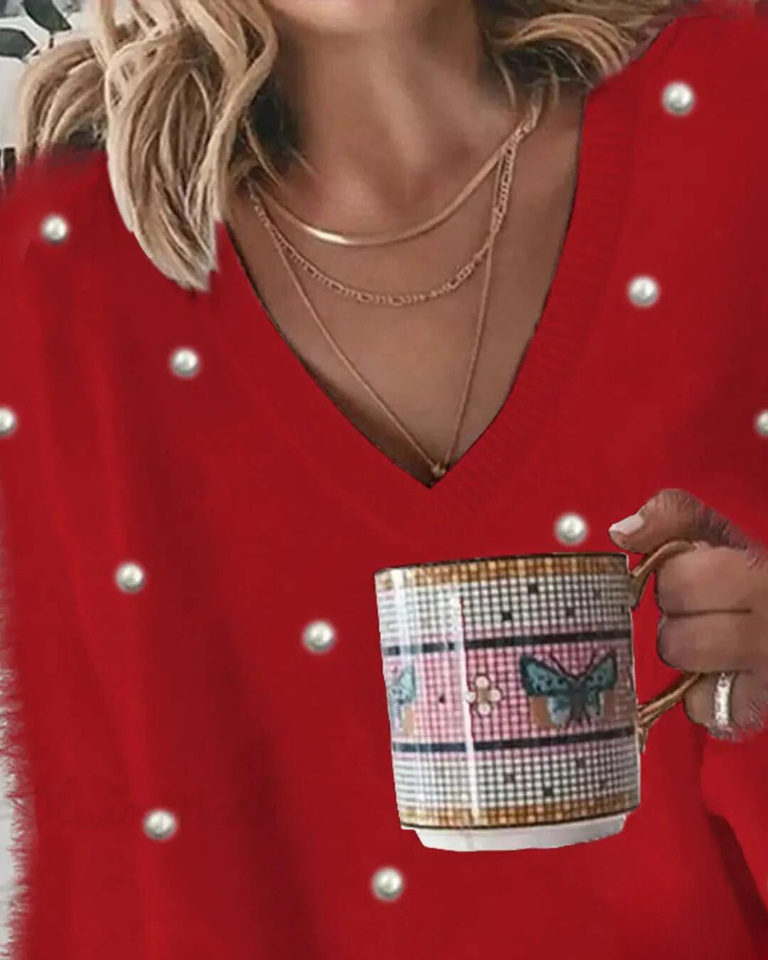 Kin | Langärmeliges flauschiges Top mit Perlen