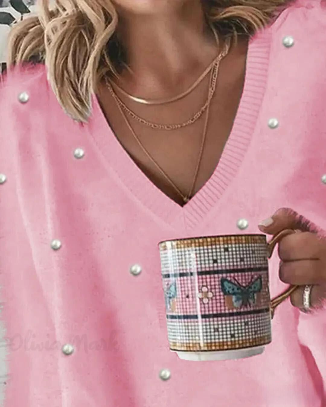 Kin | Langärmeliges flauschiges Top mit Perlen